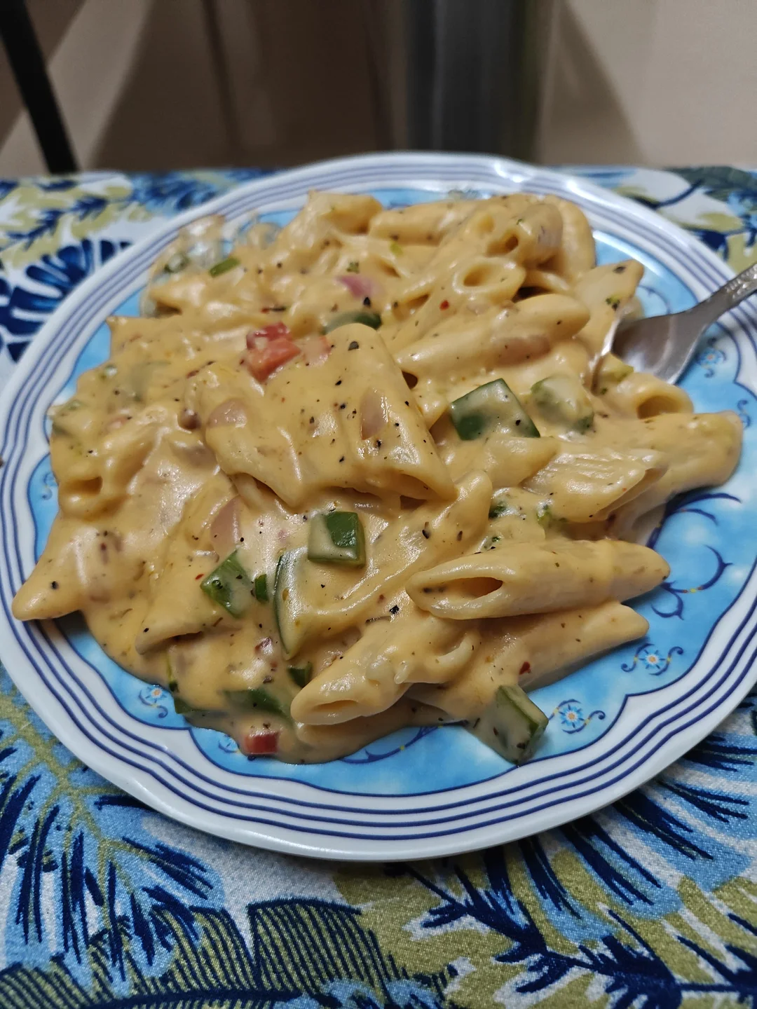 A plate of creamy penne pasta cooked by Aarush.